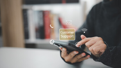 Customer support hotline Contact us people connection. Businessman using Smart Phone with the email, call phone, address, Chat message icons.