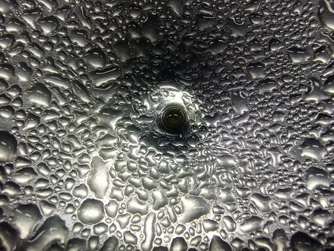 Close Up. Water Dew on stainless.