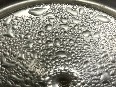 Close Up. Water Dew on stainless.