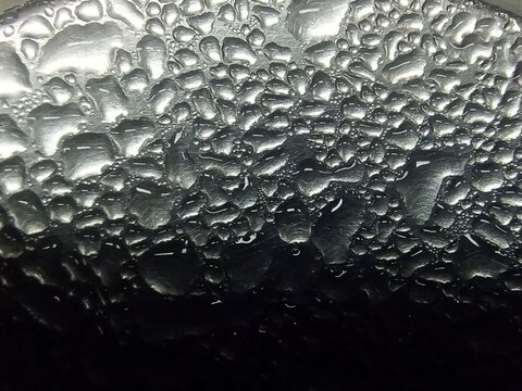 Close Up. Water Dew on stainless.