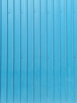 Sky blue walls. Symmetrical line background.