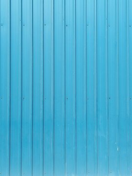 Sky blue walls. Symmetrical line background.