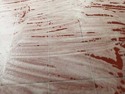Abstract background. Foamy red floor.