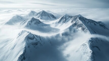 Obraz premium Snowy Mountain Landscape: An Aerial View in Soft Winter Tones