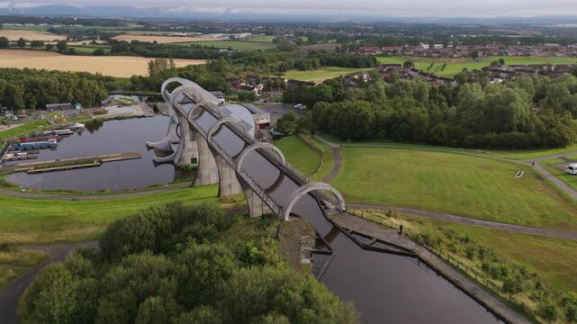 Aerial view of the Falkirk Wheel. A rotating boat lift that connects the Forth and Clyde Canals in Scotland. Also a popular tourist attraction.