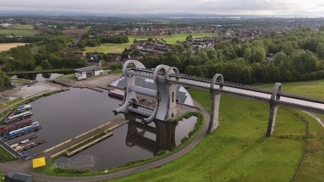 Aerial view of the Falkirk Wheel. A rotating boat lift that connects the Forth and Clyde Canals in Scotland. Also a popular tourist attraction.