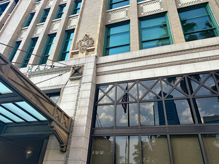 flag reflection in architectural window