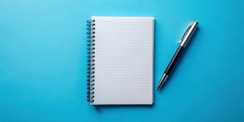 Notebook and pen resting on top of blank paper with blue background, paper, pen, notebook, blue, blank