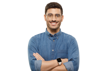 Portrait of young smiling handsome businessman wearing causal denim blue shirt, glasses and smartwatch on wrist, holding arms crossed
