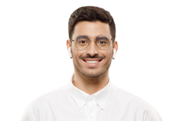 Portrait of young smiling handsome IT worker dressed in white shirt, wearing glasses and wireless earphones