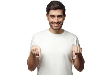 Attractive young man in white t-shirt pointing down with two fingers © Damir Khabirov