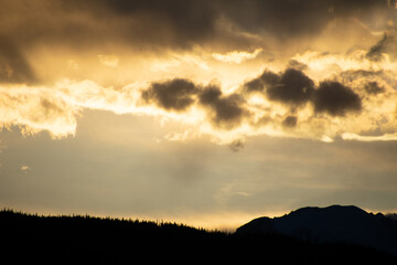 Sun setting Behind the Colorado Rocky Mountains