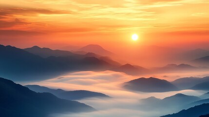 Fototapeta premium Serene Sunrise: Mountain Range Bathed in Fog