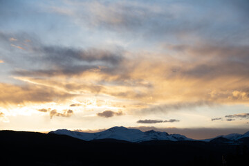 Sun setting Behind the Colorado Rocky Mountains