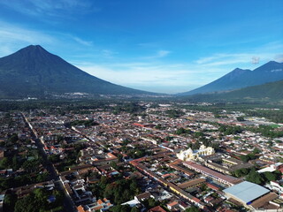 Aerial view of Antigua and the Water and Fire Volcanoes in background 