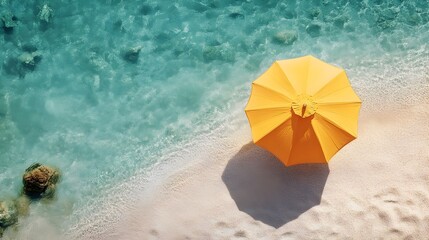 Solitary Yellow Umbrella Overlooking Tranquil Turquoise Ocean on Serene Summer Beach