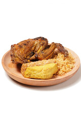 A plate of savory dishes including sweet grilled chicken with a dark brown color, fried tofu and tempeh, and crispy crumbs, served on a wooden plate against a white background.
