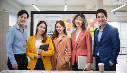 Portrait of creative business team. Creative Startup Young business people in modern office.