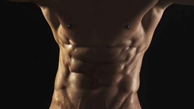 Closeup Sexy topless shirtless young man. Handsome muscular man. Sexy body of fit male sexy model. Beauty man with perfect muscular body. Hot naked young middle eastern guy enjoying his muscular body.