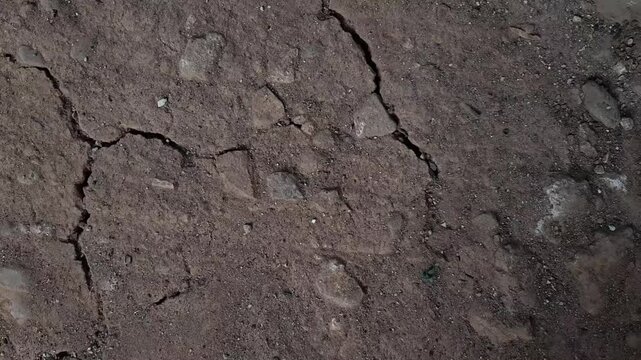 extremely dry and cracked soil surface