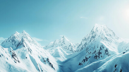 Obraz premium Snow-covered mountains with a clear blue sky