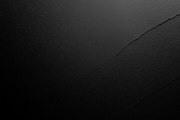 Abstract black matte background, dark painted wall texture, close-up design. AI generation.