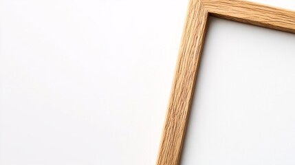 Naklejka premium Wooden picture frame with blank canvas on white background 