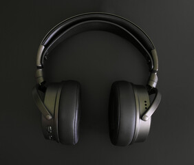 Headphones on black background.