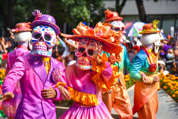 Day of the dead parade in Mexico city, Catrinas with colorful costumes in an exciting tradition