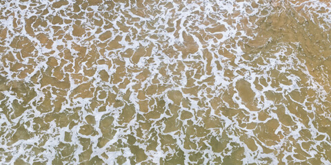 texture of the sand with sea wave
