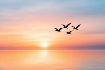 Fototapeta premium A serene sunset over a calm ocean, with birds flying gracefully against the colorful sky.