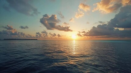 Colorful sunset over the ocean on the beautiful Maldives