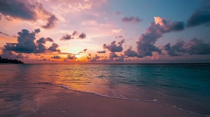 Colorful sunset over the ocean on the beautiful Maldives