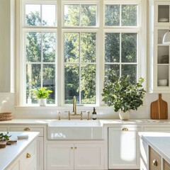 Bright kitchen with white cabinets, a farmhouse sink, and sunlight streaming through large windows