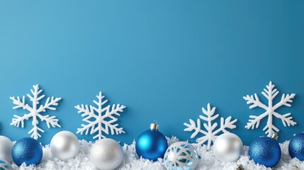 blue christmas background with snowflakes and christmas balls. Copy space backgrounds