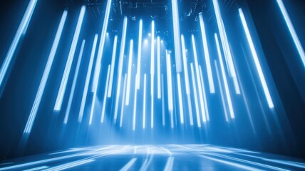 A vibrant stage design featuring hanging blue lights, creating an electrifying atmosphere for performances and events.