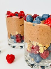 Berry Dessert in Glass with Banana Cacao Cream Photo