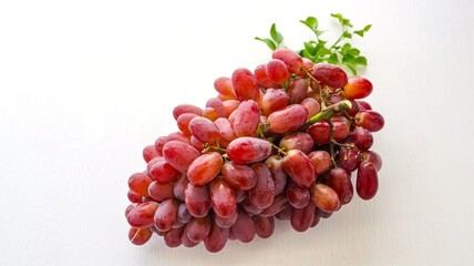 bunch of red seedless  grapes, on white background, fresh red grapes fruit