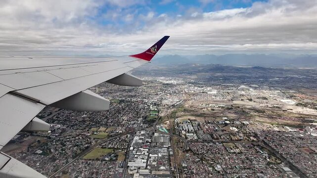 South Africa. 21.03. 2024 Passenger jet wing and winglet flying bound for Johannesburg South Africa