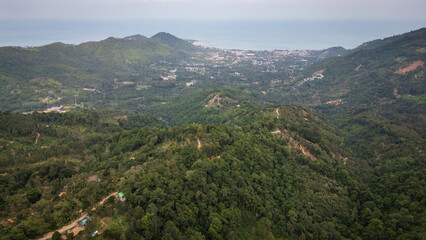 Aerial panoramic view of Koh Samui from hill jungle mountains view over Lamai beach village bay 