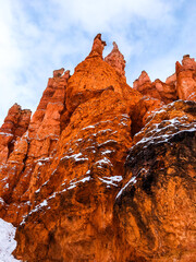 Snow scene colorful cliffs with red rock and stone in Bryce Canyon National Park