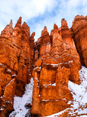 Snow scene colorful cliffs with red rock and stone in Bryce Canyon National Park
