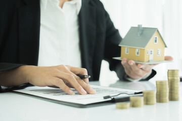 Real estate agent showing investment growths