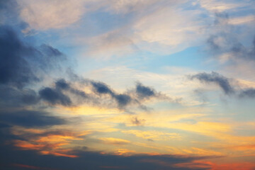 Fototapeta premium Beautiful sky background - Sunset Sunrise sky with light clouds and real sun. Dramatic twilight sky background