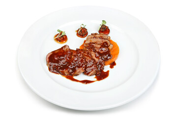 Gourmet Meat Dish with Rich Sauce on Plate
