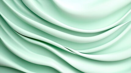 Elegant mint green fabric folds creating a smooth and silky texture, perfect for backgrounds and design projects.