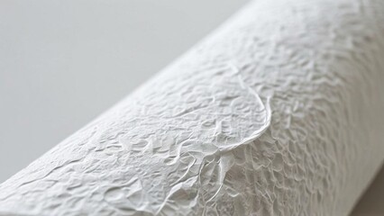 Obraz premium Close-up of white textured paper roll.