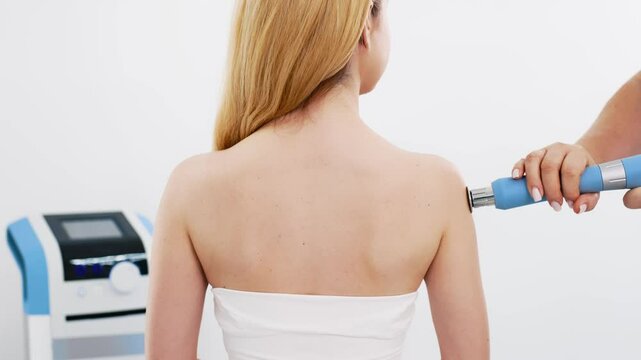 Non-invasive Shockwave Therapy (ESWT) for neck and back muscles. Promotes pain relief, muscle recovery, and spinal health. Highlights advanced physiotherapy techniques.