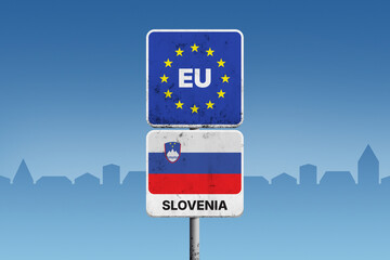 European Union border sign with Slovenia flag on an urban background