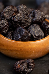 ripe purple plums and dried plums